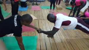 Byron Adera(right) and a participant during the Pushup challenge.